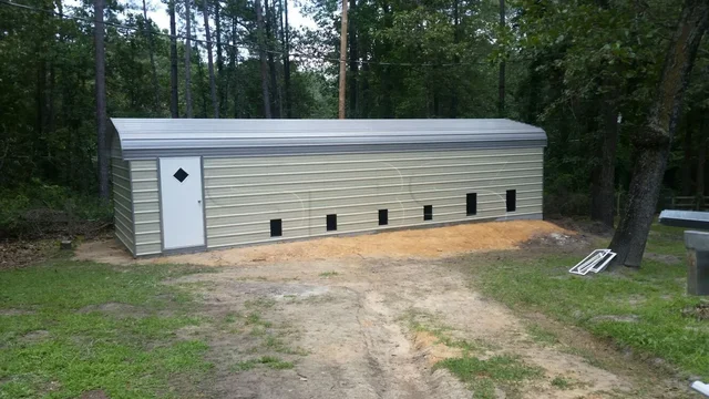 12' wide x 41' long x 7' tall fully enclosed dog kennel with 6 side openings