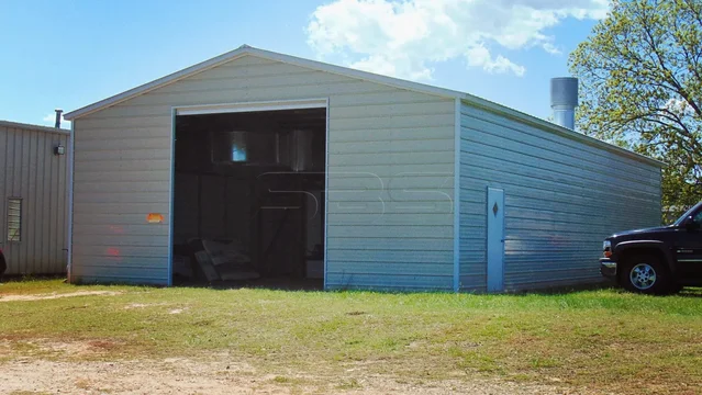 20_x_26_Vertical_Roof_garage_with_2-_9x8_roll_u.original