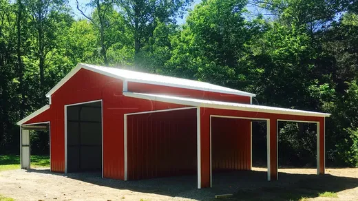 42' wide x 26' long all vertical Raised Center Aisle Barn. The middle section has 12' legs, all enclosed with a 10x10 openingLean To have 8' legs,gables and 2 square openings with header