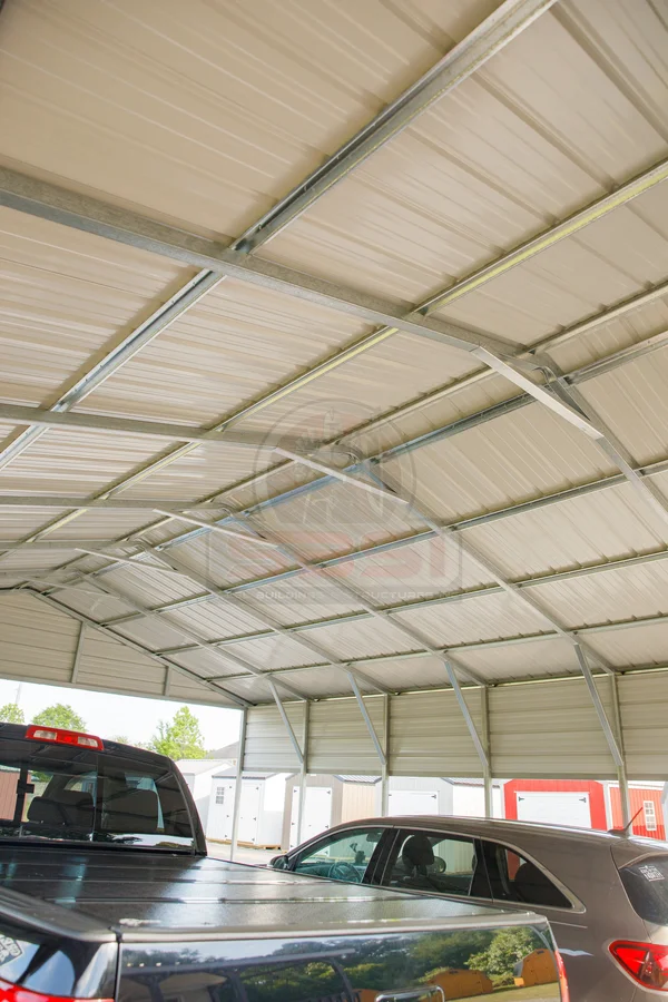 Inside 2 car carport with vertical roof and framing